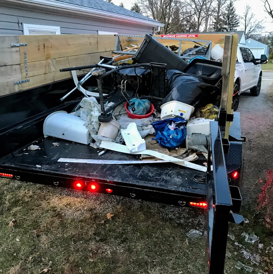 Roll-off dumpster delivered to a residential driveway in Barnstead