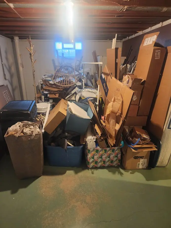 Roll-off dumpster container at job site for 2 Yard Dumpster Rental in Barnstead